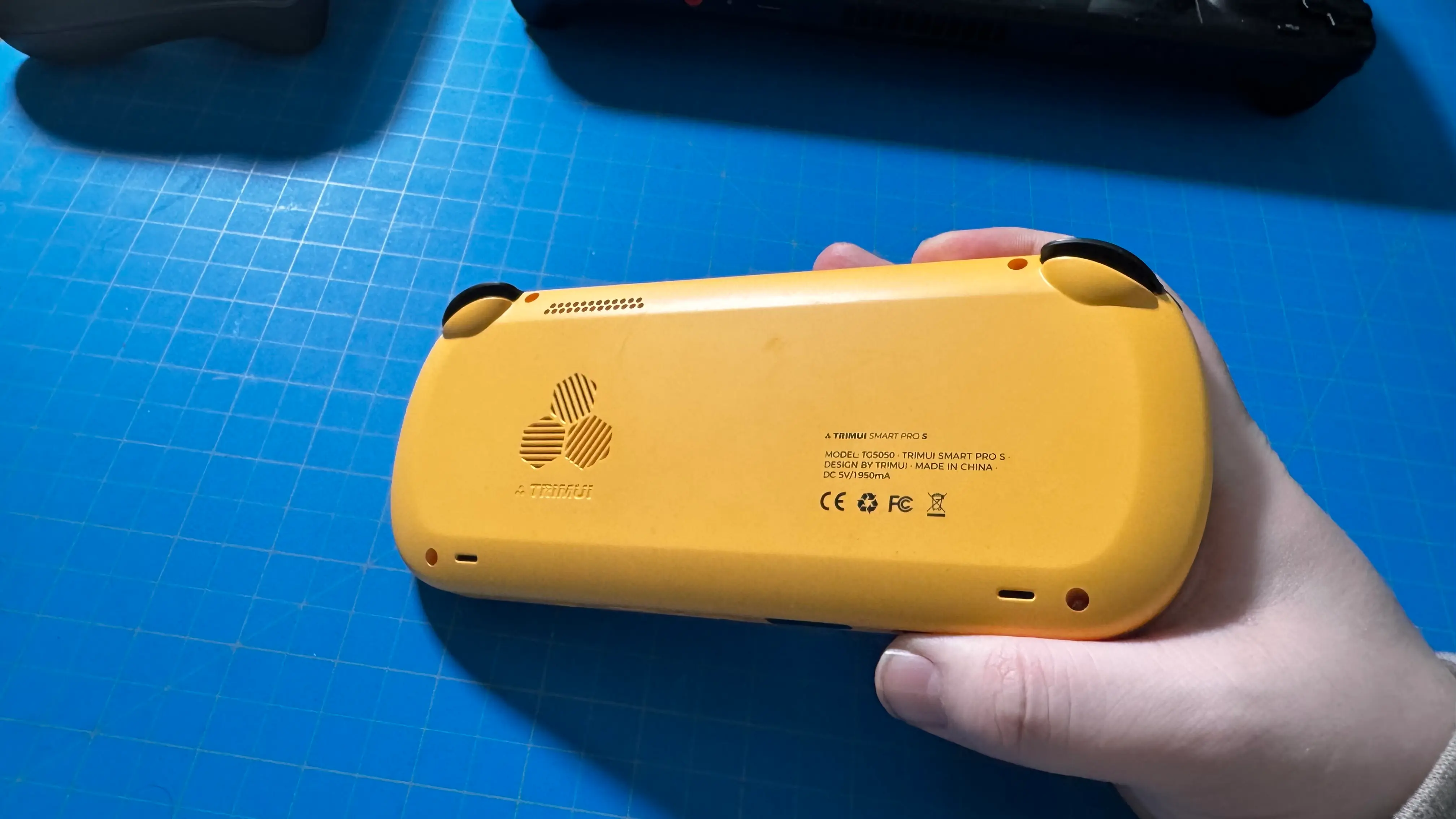 Budget Handheld Gaming Showdown: TrimUI Smart Pro S vs Anbernic RG Rotate
