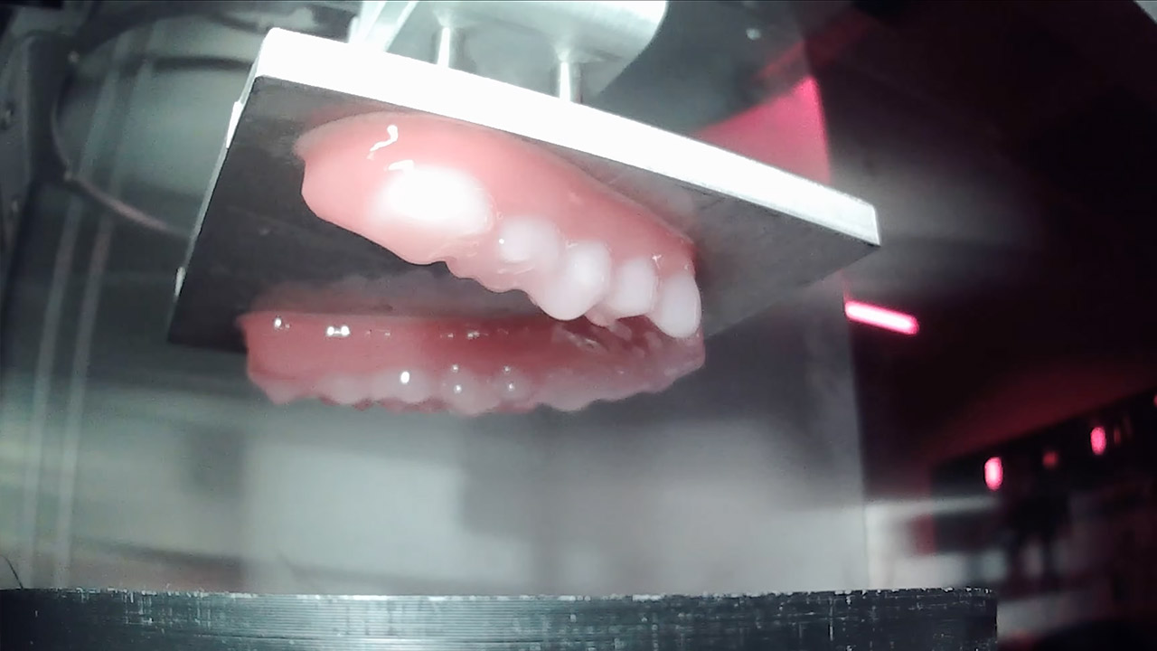Multimaterial Resin Printing Breaks Free from the Single-Resin Trap