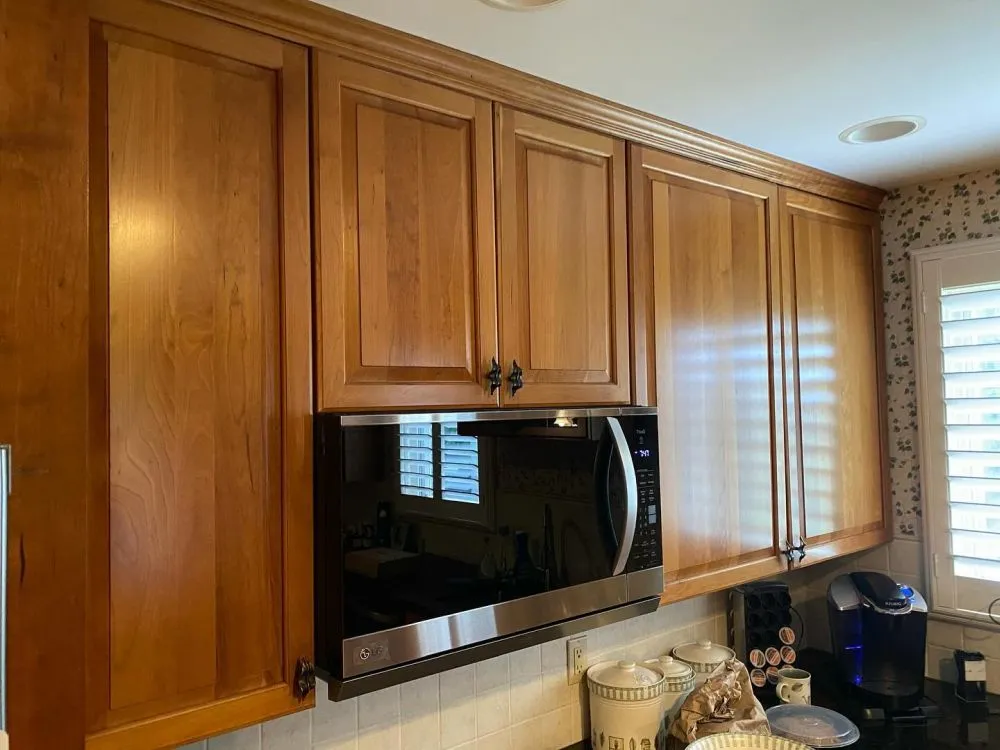 How Bold Cabinet Color Makeovers Revive Tired Kitchens