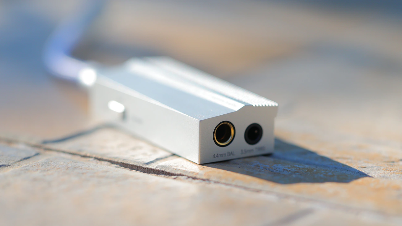 How Impedance Adapters Make High‑Power Amps Safe for Headphones