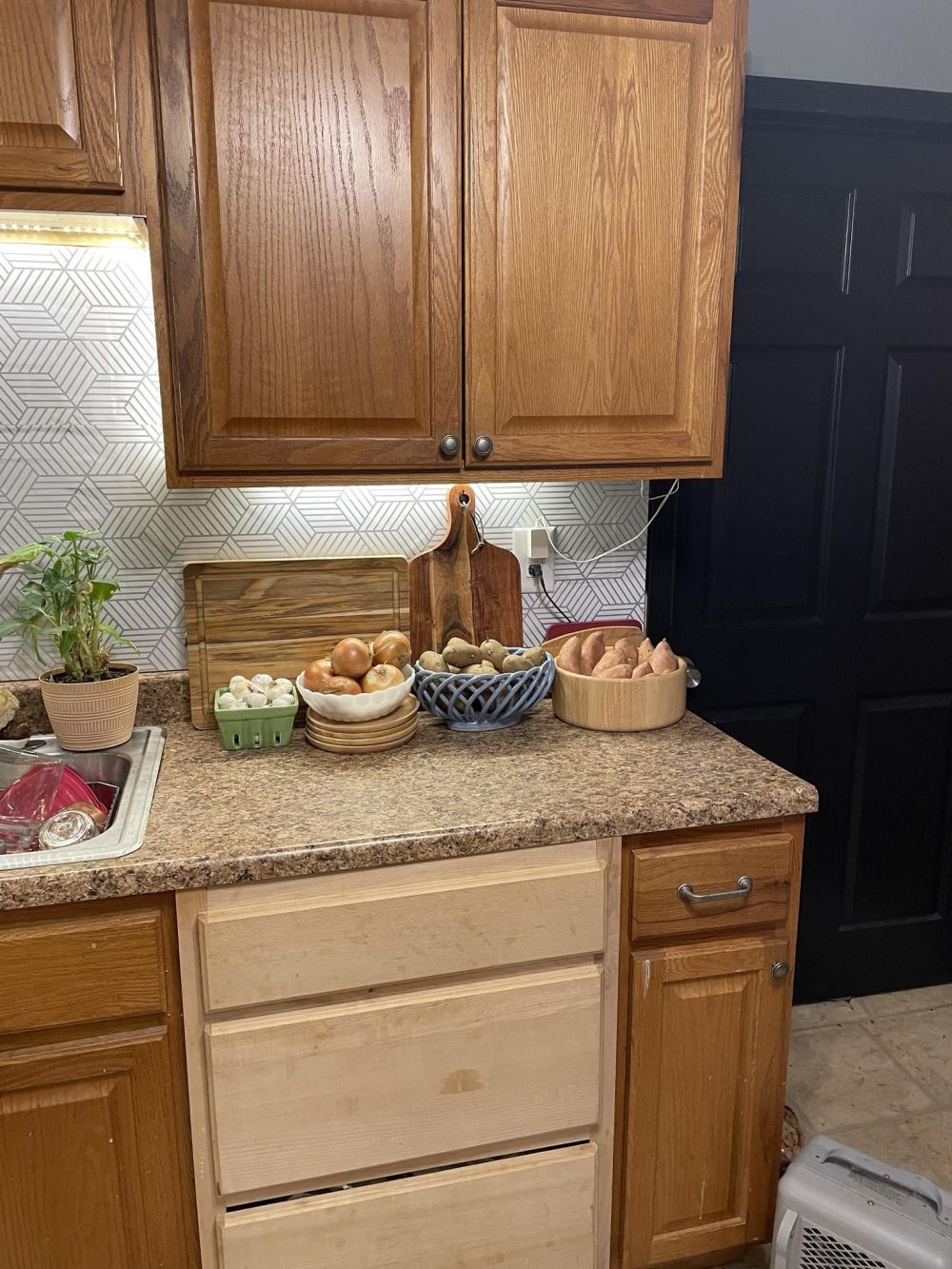 How Strategic Cabinet Paint Colors Transform a Tired Kitchen