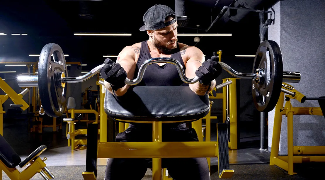 Preacher Curls and Skull Crushers: How to Build Bigger Arms with Isolation Work