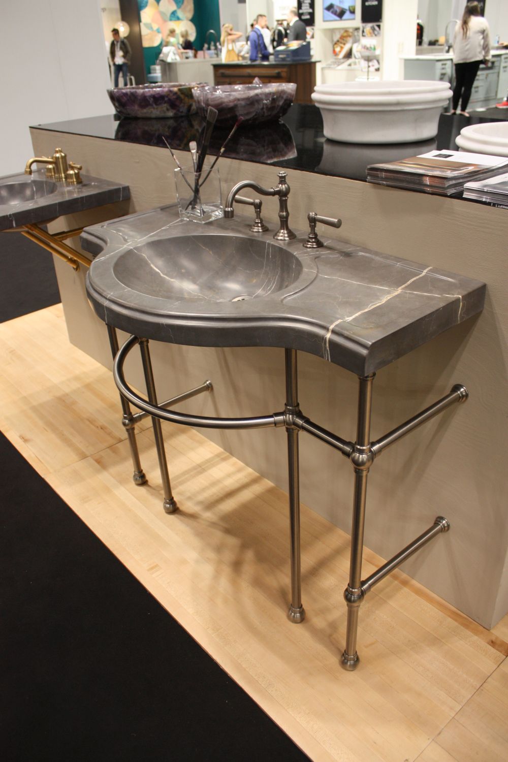 Stone Countertops Break Free From the Vanity With Sculptural Sinks