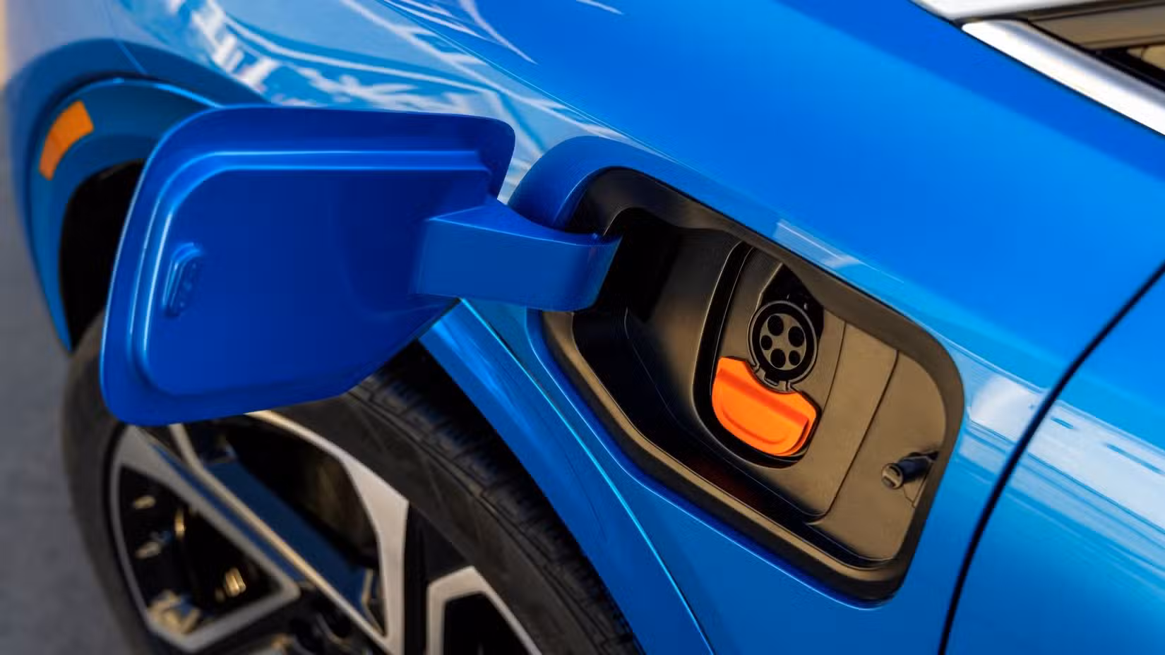 Why EV Sales Are Surging Worldwide While Drivers Turn Back to Hybrids