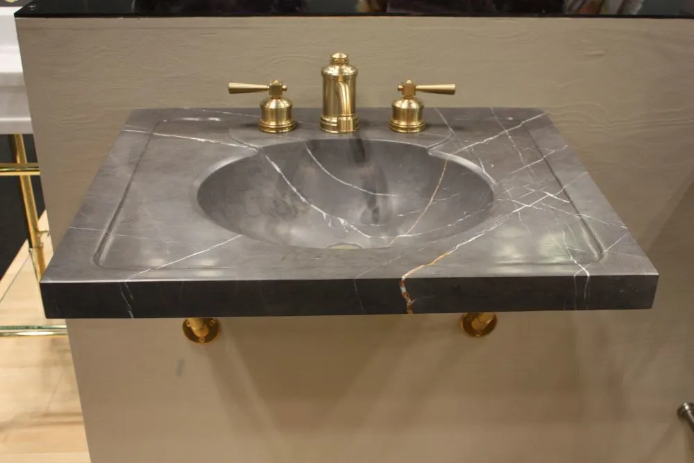 Stone Sinks and Wood-Look Tile Are Redefining Luxury Bathrooms