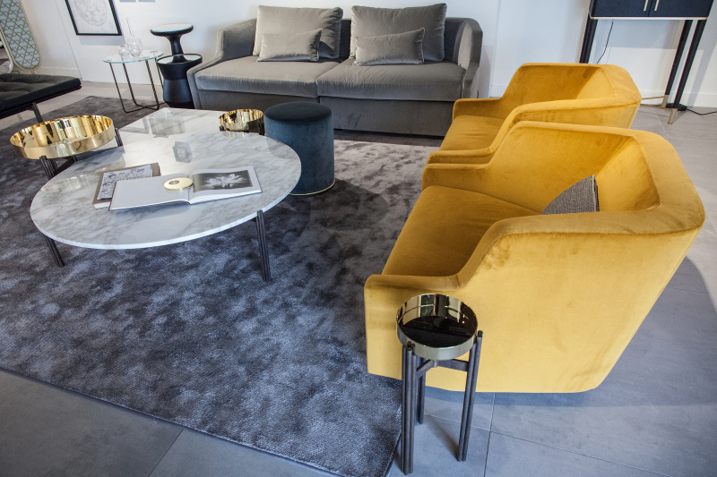 How Rugs Visually Connect Furniture And Complete A Room
