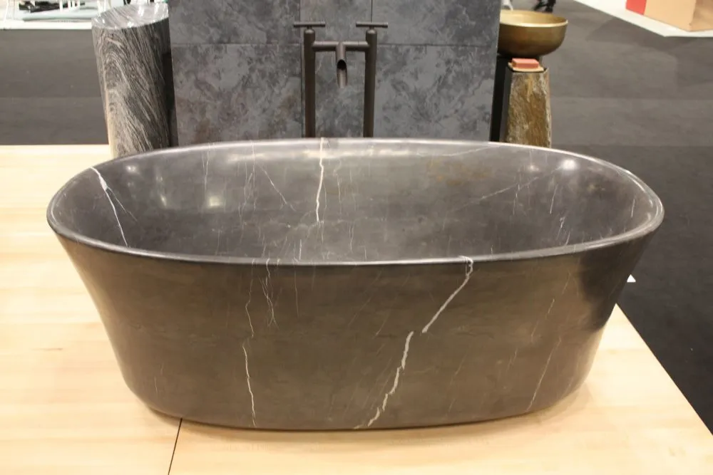 Stone Countertops and Colored Vanity Tops Are Redefining the Bathroom Sink