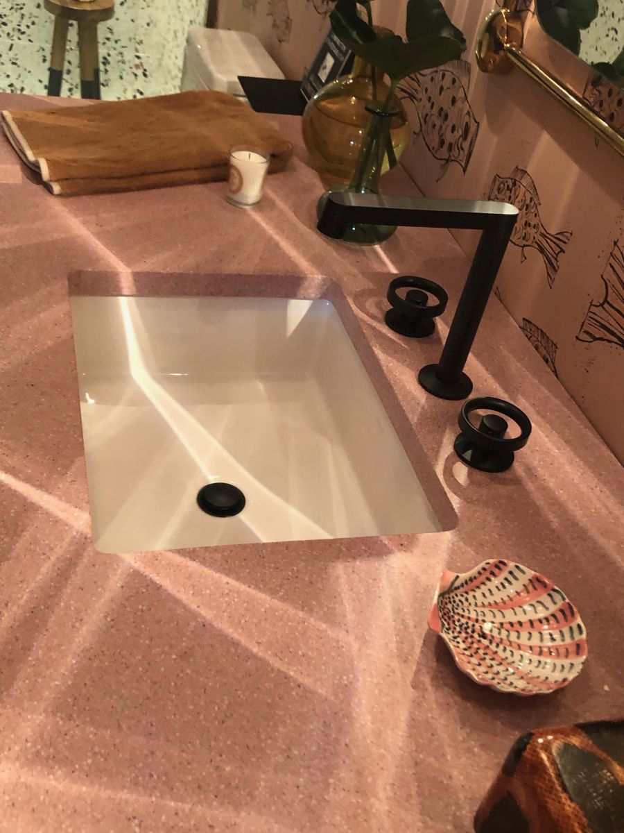 Stone Countertops Break Free From the Vanity With Sculptural Sinks