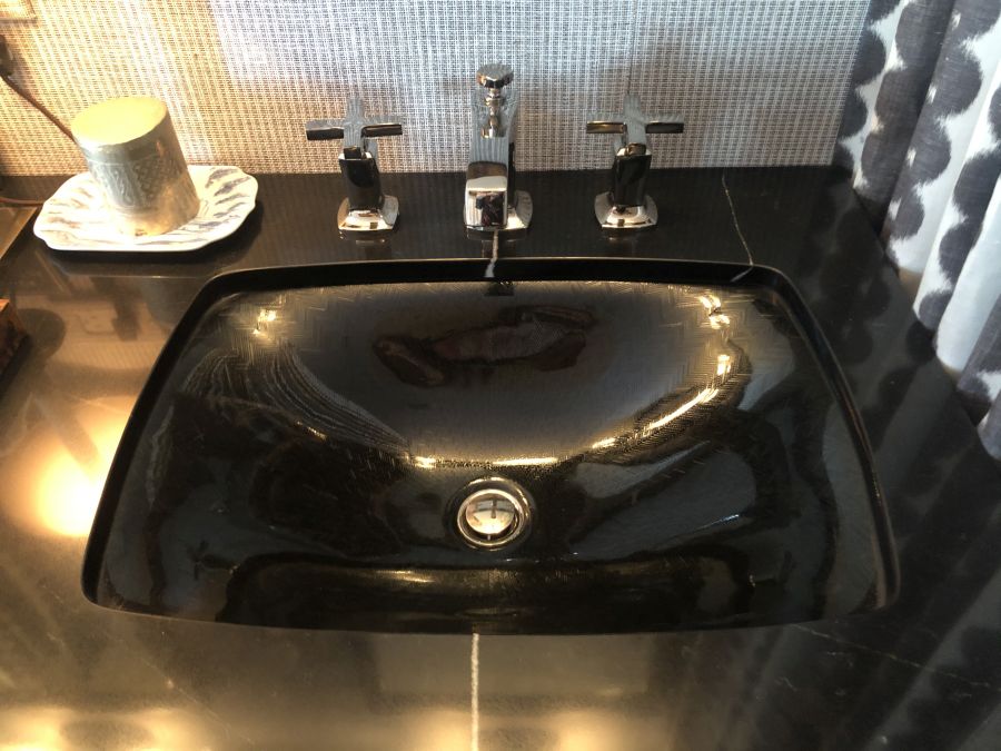 Stone Countertops Break Free From the Vanity With Sculptural Sinks