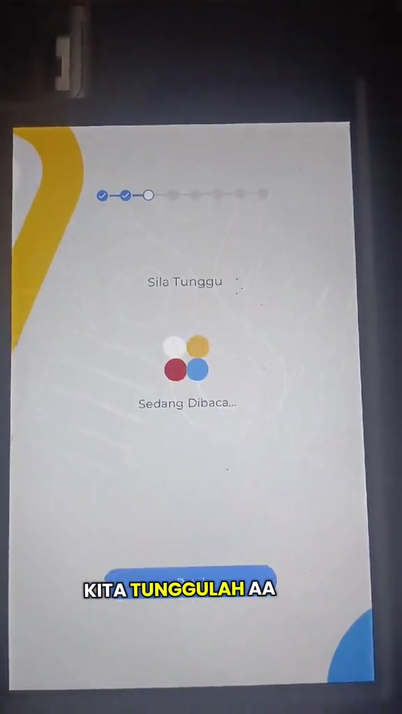 Skrin kiosk MyDigital ID paparan Sila Tunggu dan Sedang Dibaca semasa proses pembatalan berjalan