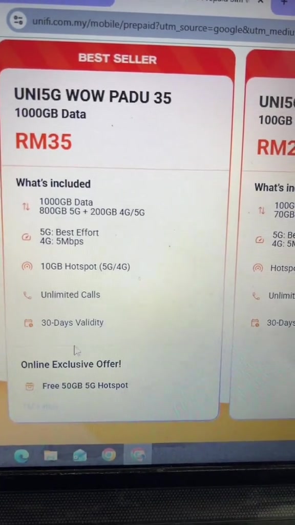 Skrin laptop memaparkan laman rasmi unifi Mobile dengan kad pelan UNI5G WOW PADU 35 harga RM35 untuk 1000GB beserta senarai kandungan pelan