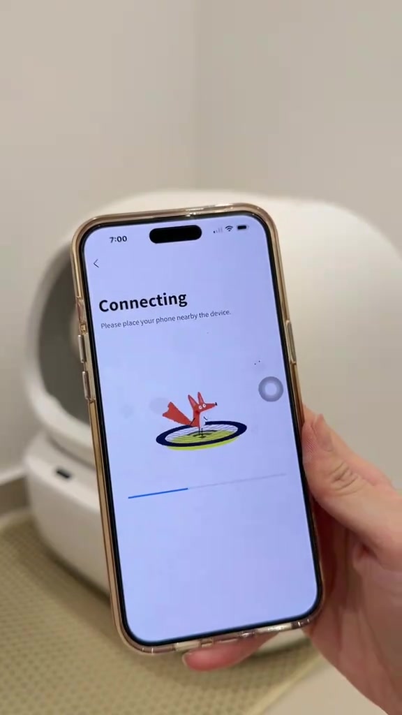 Skrin telefon pintar menunjukkan aplikasi kotak pasir automatik sedang menghubungkan peranti