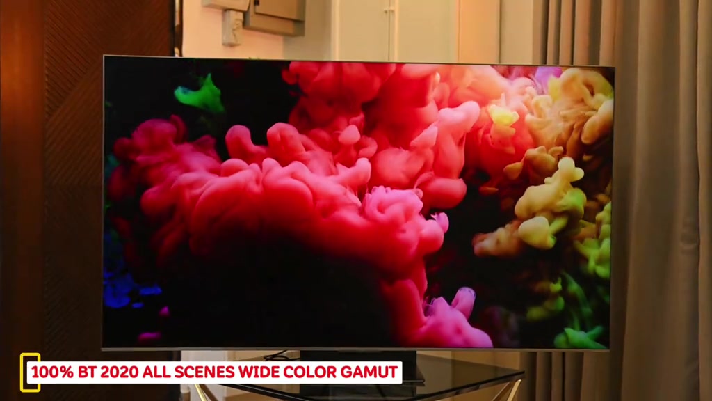 Skrin TV Mini LED memaparkan imej dakwat berwarna merah jambu dan hijau dengan kawasan gelap yang pekat, menunjukkan kontras tinggi