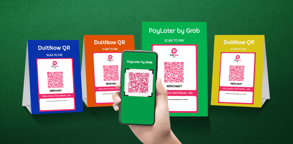 Ilustrasi tangan memegang telefon dengan app PayLater by Grab mengimbas kod DuitNow QR pada standee peniaga berwarna-warni