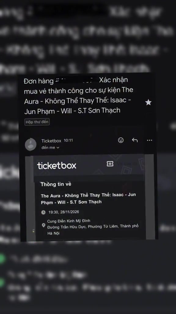 Màn hình email xác nhận mua vé The Aura thành công, hiển thị thông tin vé 19:30 ngày 28/11/2026 tại Cung Điền Kinh Mỹ Đình, đường Trần Hữu Dực, Hà Nội