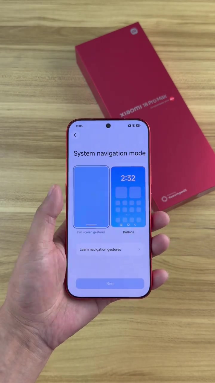 Skrin hadapan Xiaomi 18 Pro Max warna merah memaparkan paparan setup HyperOS dalam bahasa Inggeris