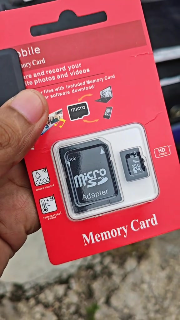 Depan pek merah Mobile Memory Card dengan ikon kalis air, kalis suhu dan logo HD VIDEO
