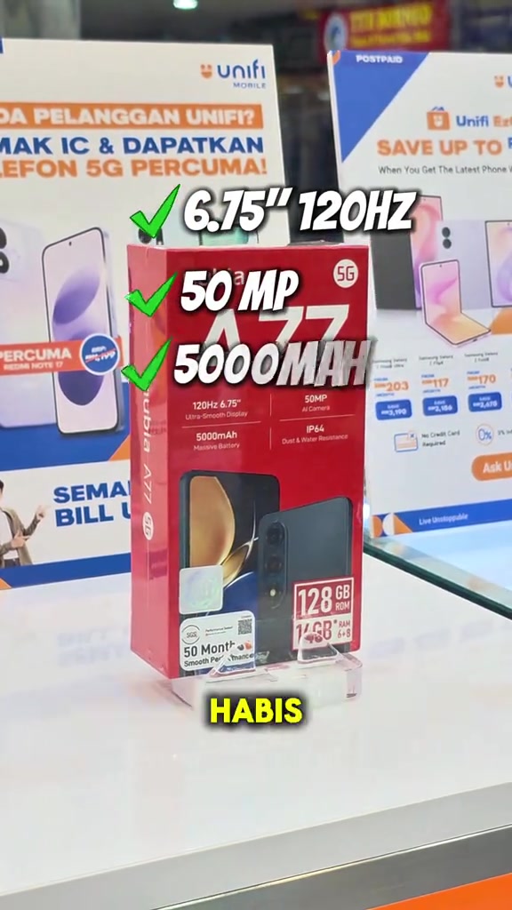 Kotak nubia A77 5G di atas meja pameran dengan poster Unifi Mobile di latar belakang mengajak pelanggan semak IC untuk telefon 5G percuma