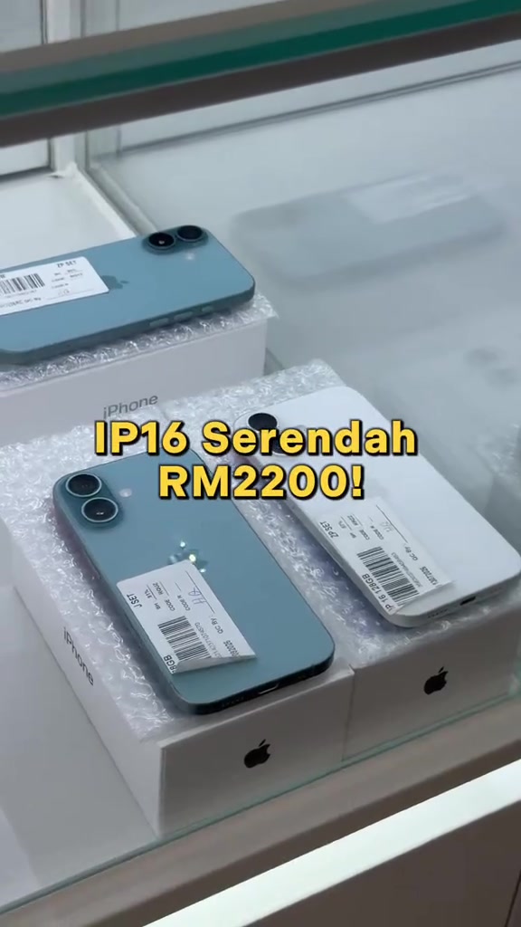 Unit iPhone 16 warna teal dan putih di atas kotak Apple dengan kapsyen harga serendah RM2,200