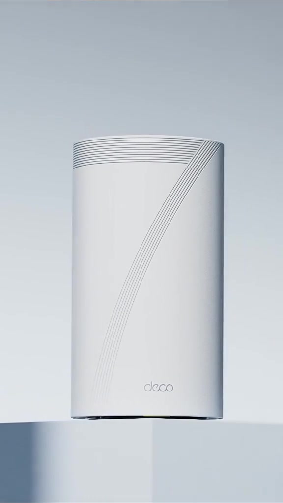 Unit mesh TP-Link Deco berwarna putih berbentuk silinder dengan logo deco di bahagian bawah