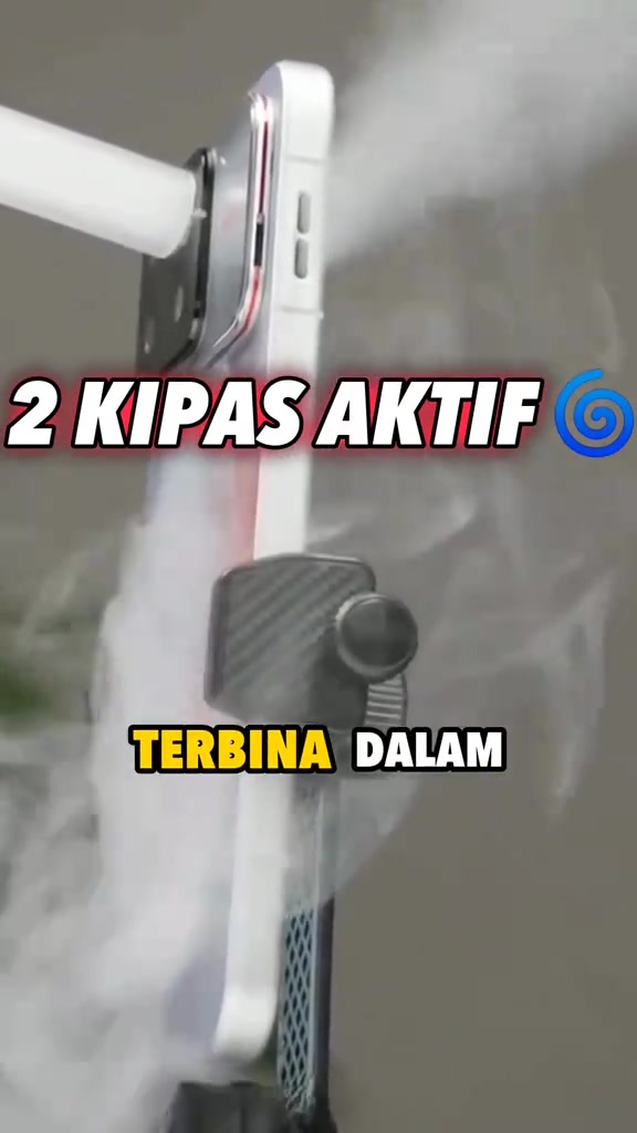 HONOR WIN 2 dipasang pada pendakap dengan wap kelihatan keluar dari sisi menunjukkan aliran udara kipas pendingin