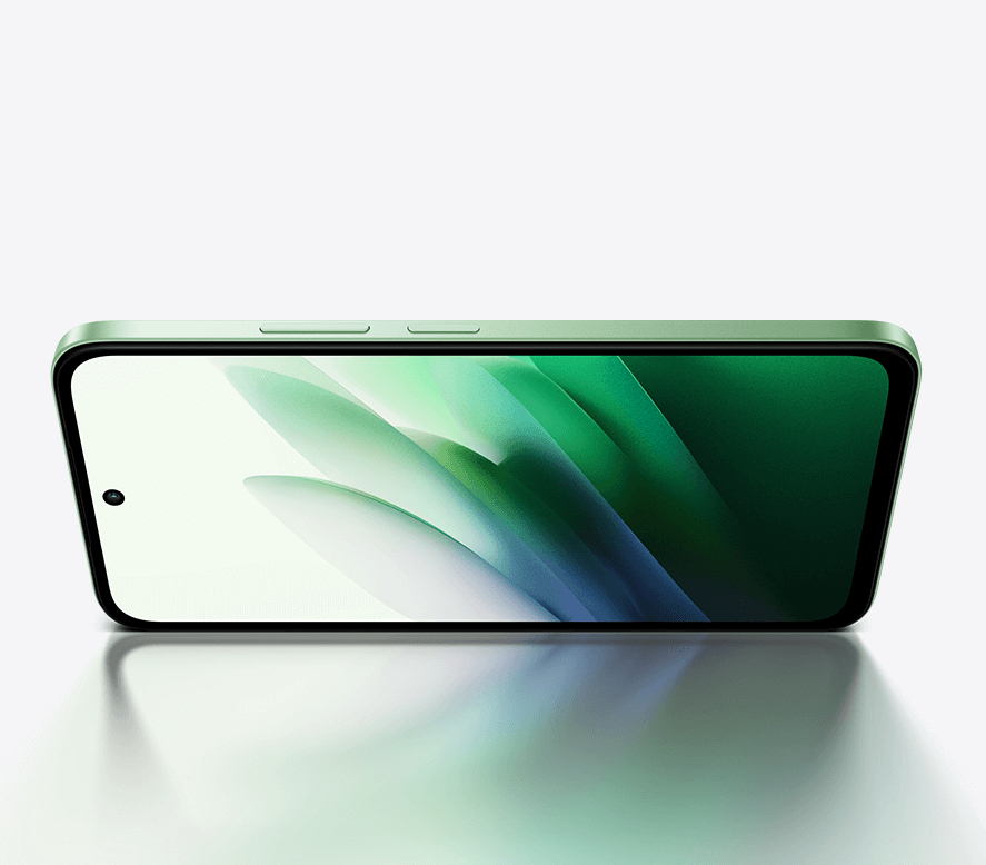 Redmi 15 5G warna hijau muda dibaringkan menampakkan skrin hadapan dan kamera depan lubang tengah